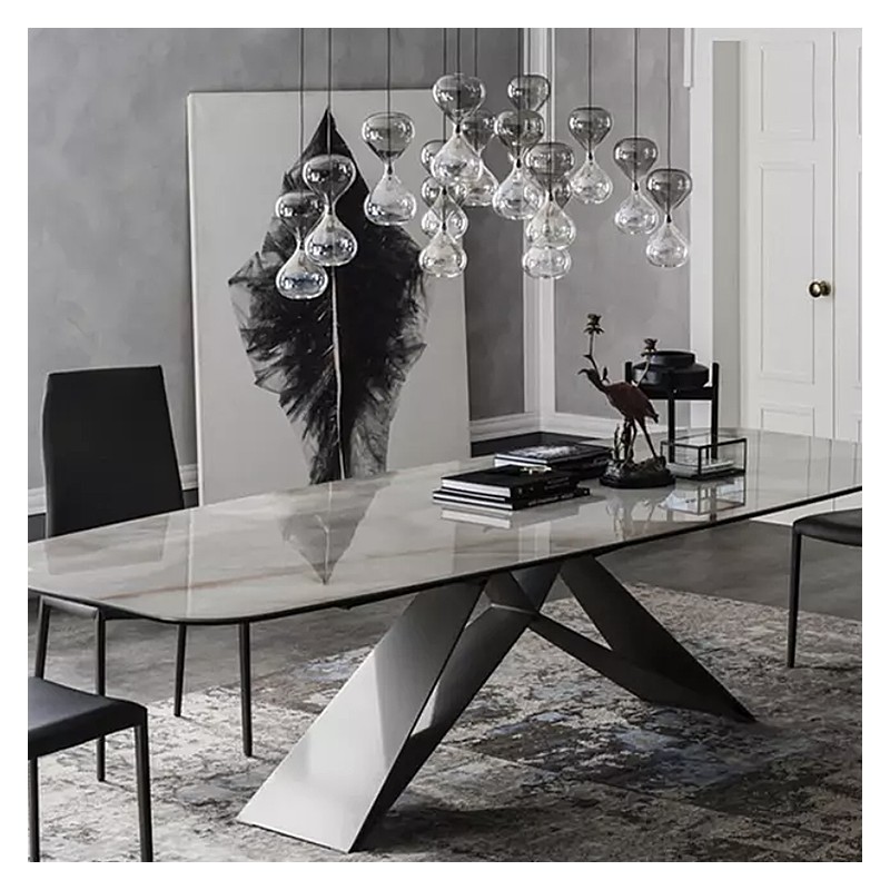 Luxurious table with its marble top. Colors black, bronze or chromed steel