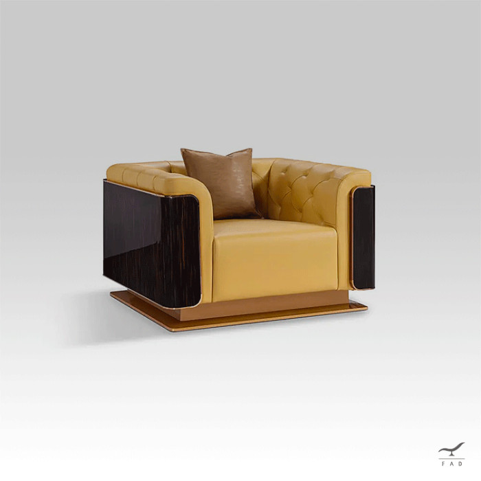 Stacy armchair with brass base and quilted leather for luxury interiors
