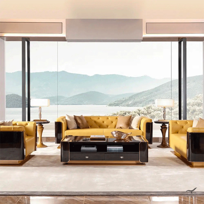 Stacy armchair with brass base and quilted leather for luxury interiors