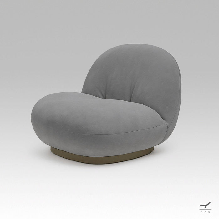 The Milo chair redefines relaxation through a blend of fluid lines, low-profile proportions, and sumptuous materials.
